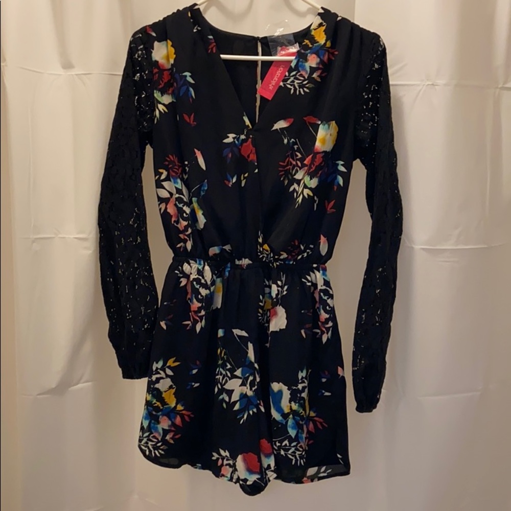 Romper with lace arms and slit back
